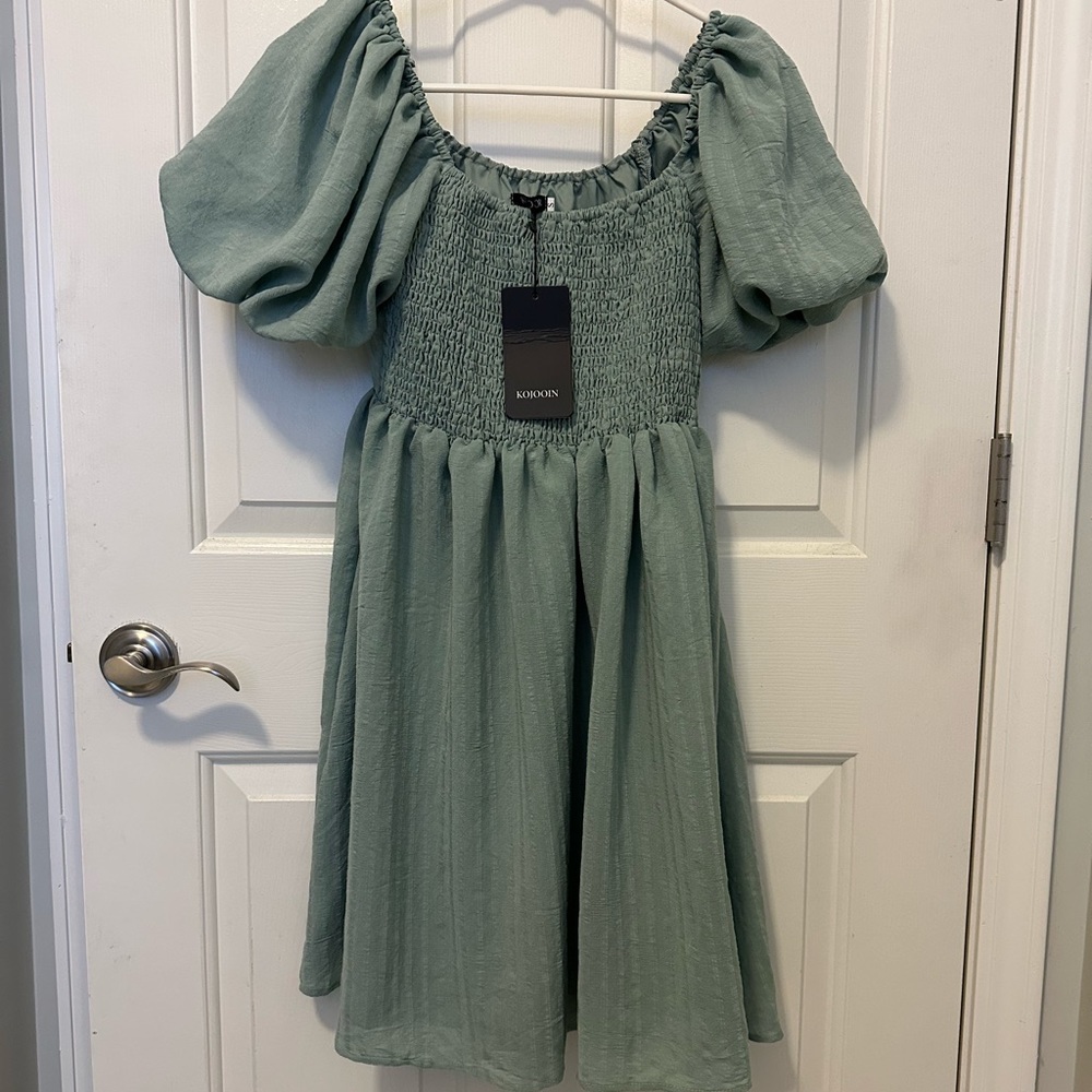 Elegant summer dress with ruched bodice. Brand new!